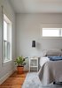 Modern home with Medium Hardwood Floor. Master Bedroom Photo 11 of OKC Farmhouse