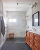 Modern home with Engineered Quartz Counter. Master Bathroom Photo 12 of OKC Farmhouse