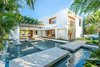 Modern home with Exterior, House Building Type, Tile Roof Material, and Flat RoofLine. “Strandhus is an architectural gem, receiving an array of accolades for its first redesign and second renovation. Featured on many home tours, it is a modern version of a classic Florida beach house — offering privacy, views and an idyllic location on Lido Shores.”
– Joel Schemmel, Premier Sotheby’s International Realty
Photo 9 of STRANDHUS, A MODERN LIDO SHORES ESTATE
