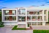 Modern home with Outdoor, Back Yard, Rooftop, Front Yard, Walkways, Garden, Large Patio, Porch, Deck, Gardens, Trees, and Grass. Designed by award-winning architect Guy Peterson in collaboration with international architect and interior designer Robert Couturier, the home embodies the Sarasota School of Architecture movement. Photo of Ultra-Contemporary Gulf-to-Bay Estate