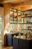 Modern home with Kitchen, Open Cabinet, and Stone Counter. Kitchen view towards Screen Porch Photo 9 of Camp on Long Lake
