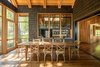 Modern home with Dining Room. Screen Porch and view towards Kitchen Photo 10 of Camp on Long Lake