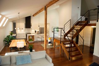 Homeowners Keith Conway and Chris Klein converted a former hayloft into a sleek, modern space that pays homage to its roots.