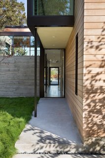 A string of glass hallways connect the four pavilions, bringing a slice of the great outdoors inside. 