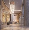 99 Hudson boasts a dramatic and welcoming double height lobby with Jura limestone, a grand chandelier, stunning onyx feature wall and private, off-street porte-cochere providing secure access by car or foot. Photo 3 of 99 Hudson modern home