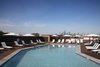 Modern home with Outdoor, Decking Patio, Porch, Deck, Wood Patio, Porch, Deck, Rooftop, Large Pools, Tubs, Shower, Large Patio, Porch, Deck, Hardscapes, and Swimming Pools, Tubs, Shower. An abundance of outdoor space is highlighted by a resort-style rooftop terrace featuring a swimming pool, private BBQ areas, outdoor bar and a fire pit – all set against the dazzling Manhattan skyline backdrop. Photo 6 of The Enclave