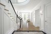 Modern home with Staircase, Wood Tread, and Wood Railing. Front Entry/Foyer Photo 2 of The Piano Estate