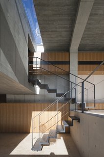 While the light-filled Chojamaru View Terrace features an unassuming concrete facade, Endo Architect and Associates carefully designed each unit of the project to have spacious interiors. The delicate staircases are sturdy but unobtrusive.