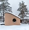 Modern home with Exterior, Wood Siding Material, Metal Roof Material, Cabin Building Type, Tiny Home Building Type, and Shed RoofLine. FLEXSE measures in at 328 square feet, with an oval footprint that maximizes floorspace, according to the designers. Photo 9 of FLEXSE