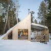 Modern home with Exterior, Cabin Building Type, Metal Roof Material, and Wood Siding Material. L'Abri reinterprets the legendary A-frame to create a secluded shelter just north of Ottawa, Canada. Photo 2 of La Pointe by L'Abri
