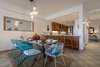 Modern home with Dining Room, Chair, Table, Floor Lighting, Bar, Storage, Recessed Lighting, Stools, and Ceramic Tile Floor. Open kitchen to dining room Photo 3 of Maui Modern, Budget-Luxury Remodeled Vacation Rental