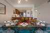 Modern home with Dining Room, Table, Chair, Ceramic Tile Floor, Stools, Recessed Lighting, and Floor Lighting. Dining room view into kitchen Photo 4 of Maui Modern, Budget-Luxury Remodeled Vacation Rental