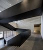 Viewing from the staircase to the atrium Photo of ZHI ART MUSEUM modern home