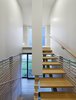 Modern home with Staircase, Metal Tread, Wood Tread, and Wood Railing. Sculptural stair frame Photo 7 of Bay of Fundy house