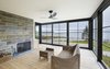 Modern home with Outdoor, Stone Patio, Porch, Deck, Walkways, Flowers, Shrubs, Trees, Grass, Hardscapes, Side Yard, Large Patio, Porch, Deck, Gardens, Wood Patio, Porch, Deck, Hanging Lighting, and Metal Fences, Wall. Screened porch with fireplace Photo 10 of Bay of Fundy house