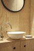 Modern home with Light Hardwood Floor and Ceiling Lighting. A simple, yet elegant vanity doubles as storage. Photo 13 of heva