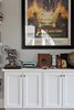 Modern home with Living Room. Custom cabinetry by McKinney Homes holds additional film treasures and houses Stephen’s Indiana Jones collection of a 1981 Italian subway poster, film scripts and movie relics from Steven Spielberg’s iconic action/adventure series. Photo 6 of Pinewood Forest Huxley Terrace Home