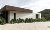 Modern home with Exterior, Flat RoofLine, Metal Roof Material, House Building Type, and Stone Siding Material. Fachada Photo 2 of Entremuros House