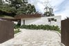 Modern home with Exterior, Metal Roof Material, Stone Siding Material, Flat RoofLine, and House Building Type. Fachada Photo 15 of Entremuros House