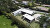 Modern home with Exterior, Stone Siding Material, House Building Type, Flat RoofLine, and Metal Roof Material. Aerial Photo 4 of Entremuros House