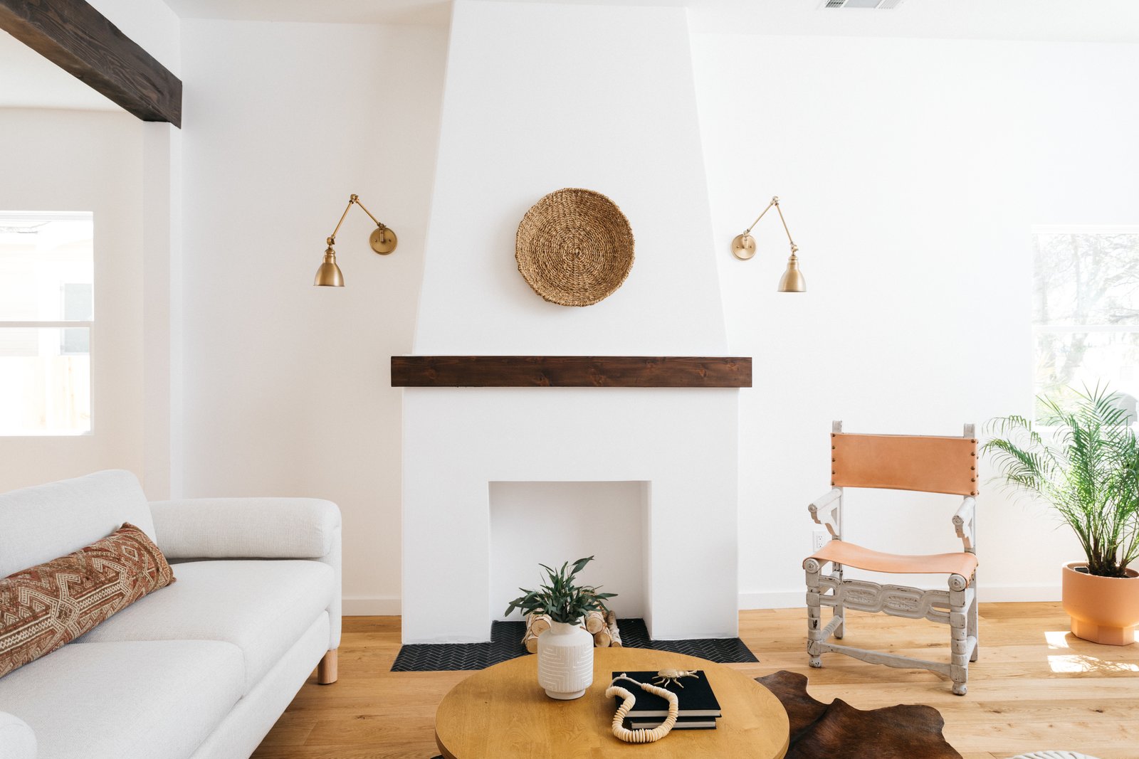 Photo 1 Of 18 In Marvelous Modern Spanish By Julian Porcino Dwell   Decorative Fireplace With Hardwood Mantel And Black Herringbone Tile Grounds The Living Area 