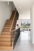 Modern home with Staircase, Metal Railing, and Wood Tread. Main staircase Photo 2 of Harimon House