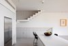 Modern home with Staircase, Wood Tread, and Metal Railing. Sideview of stairs Photo 6 of Harimon House