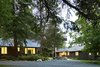 Modern home with Exterior, Cabin Building Type, Metal Roof Material, Wood Siding Material, and Gable RoofLine. Entry drive to the new Sleeping Cabin and remodeled Long Cabin. Photo 3 of Island Cabins