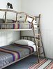 Modern home with Bedroom, Bed, Medium Hardwood Floor, and Wall Lighting. Sleeping Cabin bunk beds. Photo 9 of Island Cabins
