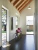 Modern home with Hallway and Dark Hardwood Floor. Sleeping Cabin entry hall. Photo 10 of Island Cabins
