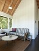 Modern home with Dark Hardwood Floor. Sleeping Cabin sitting room. Photo 12 of Island Cabins
