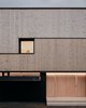 Modern home with Exterior, Shed RoofLine, Wood Siding Material, Metal Roof Material, and House Building Type. Facade Detail Photo 7 of Semi detached house on a hillside