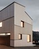 Modern home with Exterior, Shed RoofLine, Metal Roof Material, House Building Type, and Wood Siding Material. Back 02 Photo 8 of Semi detached house on a hillside