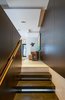 Stairs and landing Photo 6 of BRICKELL PH REIMAGINED BY EOLO DESIGN, OPENING SPACES FOR ENTERTAINING AND HIGH DESIGN WITH ORNARE KITCHENS, CLOSET AND BATH modern home