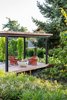 Modern home with Outdoor, Back Yard, Shrubs, Metal Patio, Porch, Deck, Trees, Wood Patio, Porch, Deck, Flowers, Grass, and Walkways. Landscape Design by Land Morphology Photo 4 of Magnolia Residence
