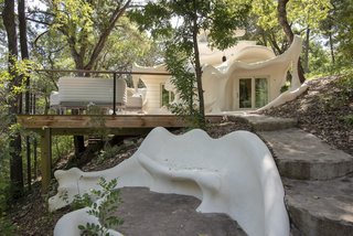 Harker made this bench prototype to show Bloom what the home would eventually look like. Today, guests can relax amid the forest or spend time on the patio, which was added by owners in the 1980s.