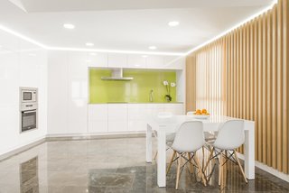 The kitchen and dining areas are now seamlessly connected. 