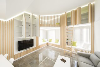 The walls hide built-in storage.