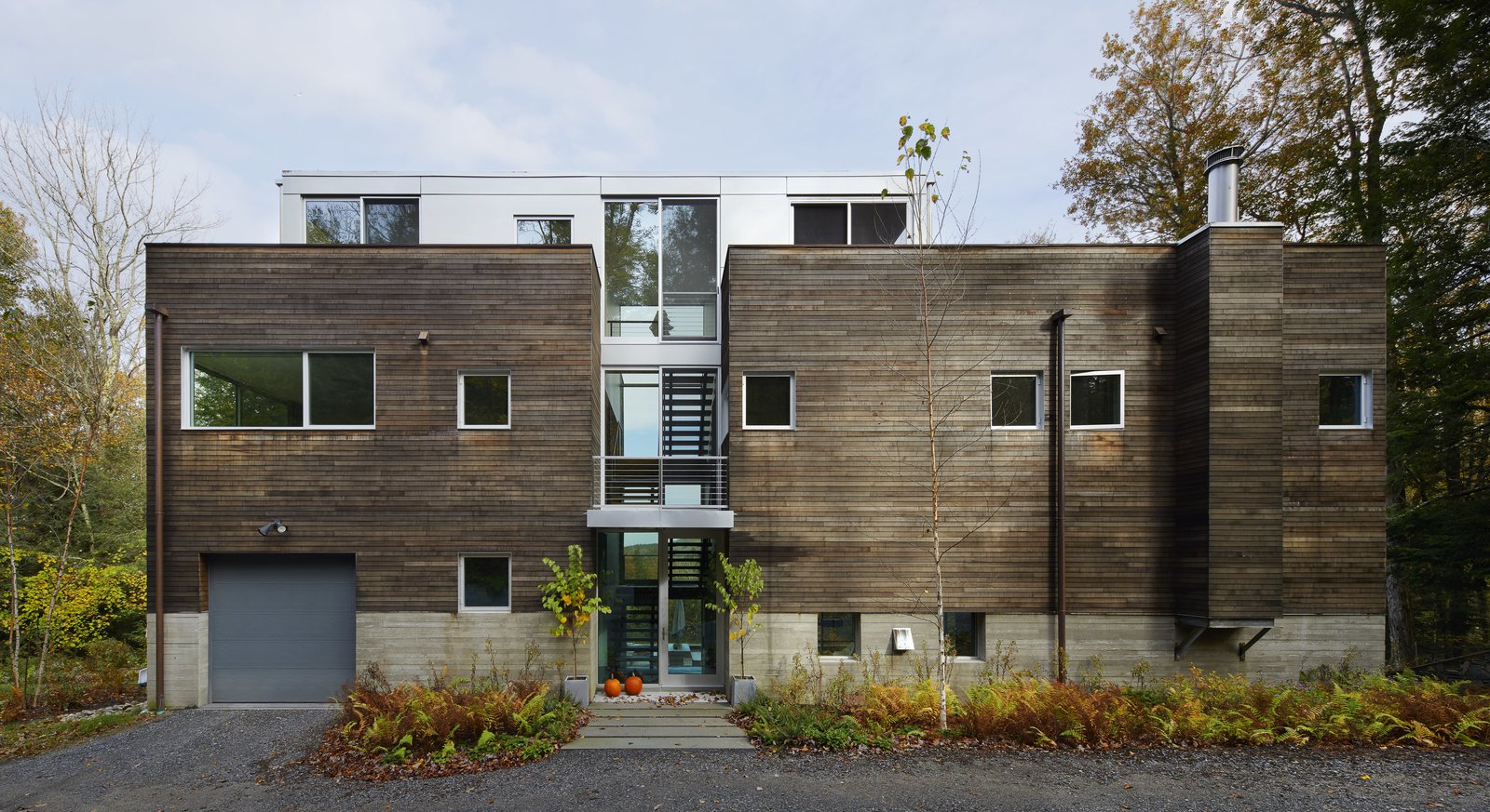 Red Teak was the Diamond's material of choice for their Berkshires home. The pre-fab home is also constructed with concrete and aluminum.