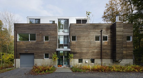 Red Teak was the Diamond's material of choice for their Berkshires home. The pre-fab home is also constructed with concrete and aluminum.