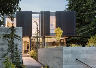 While very modern for the neighborhood, the home still fits and pays respect to the landscape. 