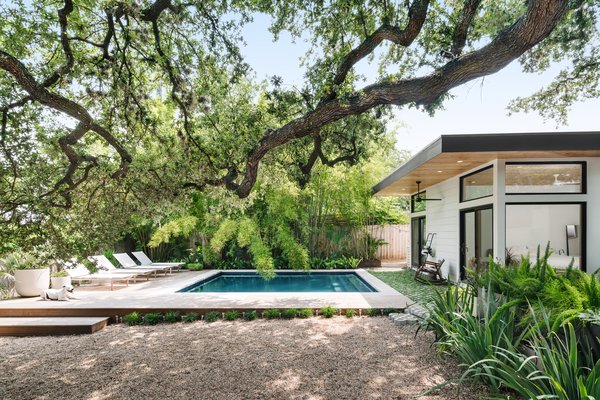 The couple had spent a lot of time in Palm Springs, as well as at Austin's Hotel San Jose, and they knew they wanted a pool to provide relief from the Texas heat. Ryan Lemmo sketched out the pool location so the couple could enjoy the live oaks and landscaping during their daily summer swims.