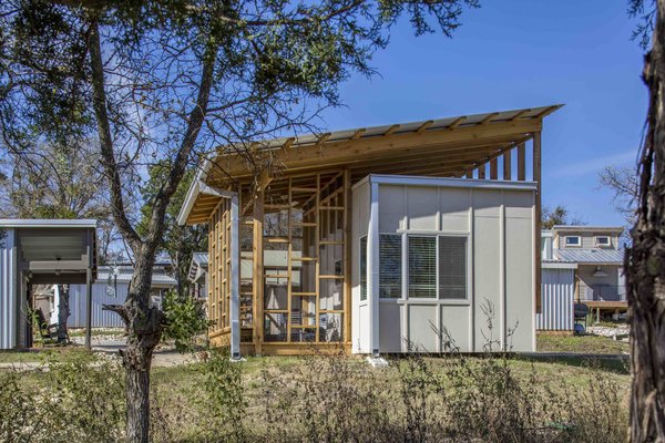 "The main issue with site planning is the units are relatively dense out there," Taylor says. "The building has to take advantage of sun orientation and seasonal breezes, but also have privacy. This site, in particular, was also next to a swale so there are many insects during the summer months."