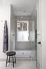 Modern home with Bath Room, Ceramic Tile Floor, Ceramic Tile Wall, Ceiling Lighting, and Enclosed Shower. Owner's Bath Photo 7 of AU Park Addition / Renovation