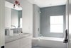 Modern home with Bath Room, Ceramic Tile Wall, Undermount Sink, Laminate Counter, One Piece Toilet, Alcove Tub, Wall Lighting, Ceramic Tile Floor, Mosaic Tile Wall, and Ceiling Lighting. Kid's Bathroom Photo 10 of AU Park Addition / Renovation