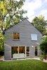 Modern home with Outdoor, Gardens, Trees, Shrubs, Grass, Stone Patio, Porch, Deck, and Back Yard. New Rear Facade Photo 4 of Albemarle Addition / Renovation
