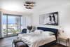 Modern home with Medium Hardwood Floor. The master bedroom. Photo 14 of The Layers apartment