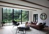 Modern home with Living Room, Sofa, Light Hardwood Floor, Chair, and Ceiling Lighting. Living Room Photo 3 of Sterling Ridge