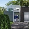 Modern home with Exterior. Sandy and Lou Grotta Photo 7 of The Grotta House