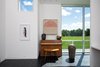 Modern home with Living Room. Living room - Textile: Lenore Tawney, ceramics by Toshiko Takaezu, bench Joyce and Edgar Anderson, piano: Andreas Christensen Photo 3 of The Grotta House